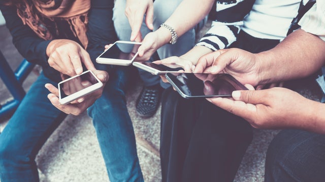 group of people using smart phone 
