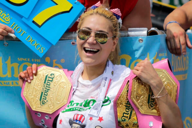 Miki Sudo celebrates after winning the women's annual Nathan's Famous hot dog eating contest on July 4, 2018, in the Coney Island neighborhood of the Brooklyn borough of New York City. 