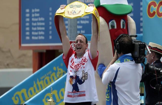 Joey Chestnut wins the annual Nathan's Famous hot dog eating contest, setting a new world record by eating 74 hot dogs in Brooklyn, New York, July 4, 2018. 