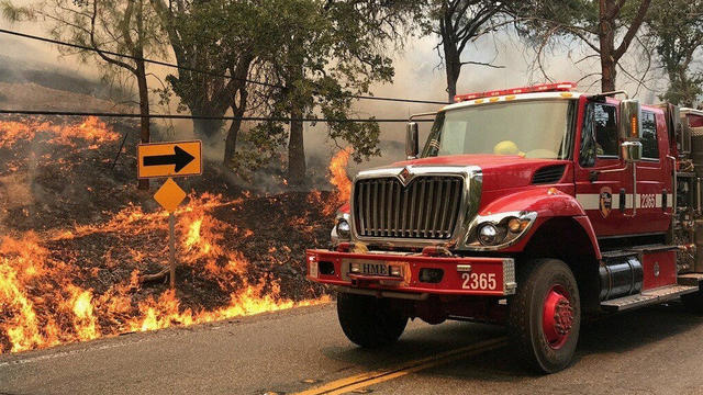 Flames from the County Fire, covering Yolo and Napa counties, east of Lake Berryessa, California, U.S. are pictured in this  handout photo 