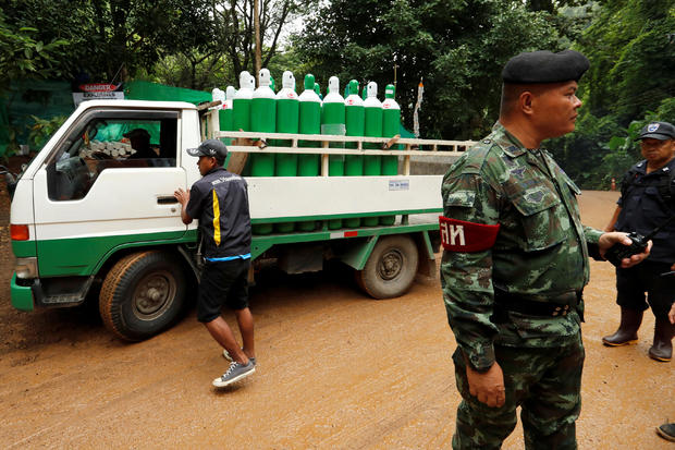 A truck carrying oxygen tanks arrives outside the Tham Luang cave complex, where 12 schoolboys and their soccer coach were trapped inside a flooded cave, in the northern province of Chiang Rai, Thailand, July 8, 2018. 