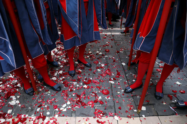 Petals thrown at a statue of Saint Fermin lie on the ground during a procession on the saint's day at the San Fermin festival in Pamplona 