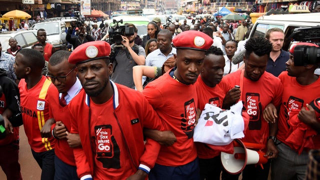 Ugandan musician turned politician, Robert Kyagulanyi, leads activists during a demonstration against new taxes including a levy on access to social media platforms in Kampala 