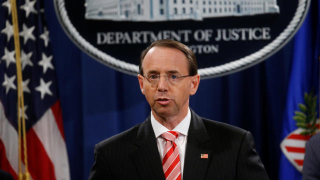 Deputy U.S. Attorney General Rosenstein holds news conference to announce indictments in special counsel Robert Mueller's Russia investigation at the Justice Department in Washington 