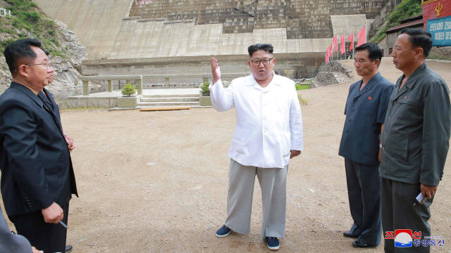 North Korean leader Kim Jong Un gives field guidance during his visit to the under construction Orangchon Power Station 