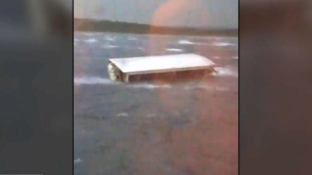 A duck boat is seen sinking during rough weather in Table Rock Lake in the Branson area of Missouri in a screen capture from video on July 19, 2018. 