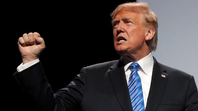 U.S. President Donald Trump gestures as he addresses the Veterans of Foreign Wars’ 119th VFW national convention in Kansas City 