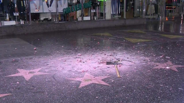 A pickax is seen next to the spot for President Trump's star on the Hollywood Walk of Fame, which was damaged early on July 25, 2018, in Los Angeles. 