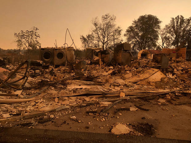 A burned out home in the small community of Keswick is shown from wildfire damage near Redding, California 