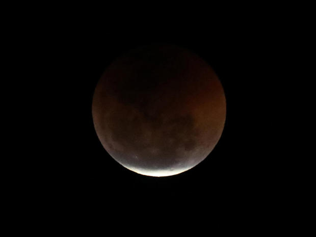 The moon is seen during the longest lunar eclipse of the 21st Century, in Rio de Janeiro 
