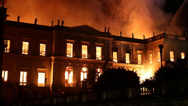 Firefighters try to extinguish a fire at the National Museum of Brazil in Rio de Janeiro 