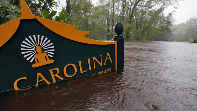 A sign for the Buddhist Association of North Carolina is partially submerged as waters rise after Hurricane Florence swept through in North Carolina 