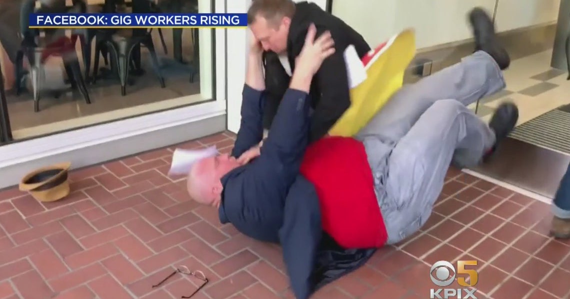 Security Guard Tackles Uber Driver Outside Company Headquarters - CBS ...