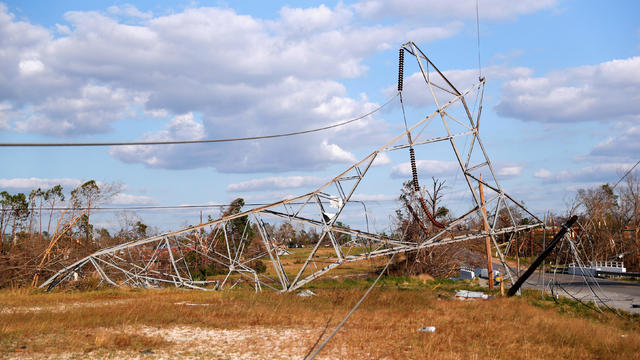 An electrical tower lies on its side in the aftermath of Hurricane Michael in Springfield 