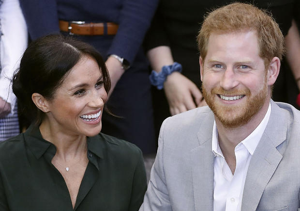 Prince Harry, Duke of Sussex and Britain's Meghan, Duchess of Sussex 