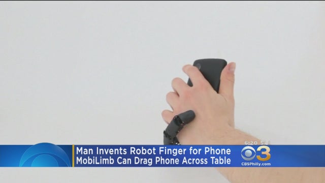 man-invents-robot-finger-for-cellphone.jpg 