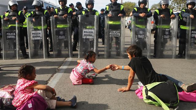 Immigrant Caravan Members Gather At U.S.-Mexico Border 