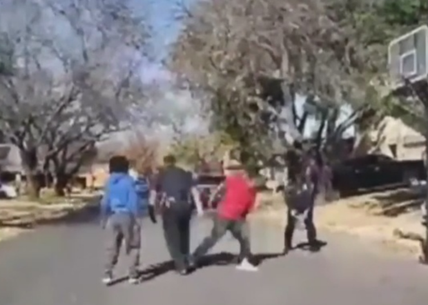 Bedford Police play basketball with kids 