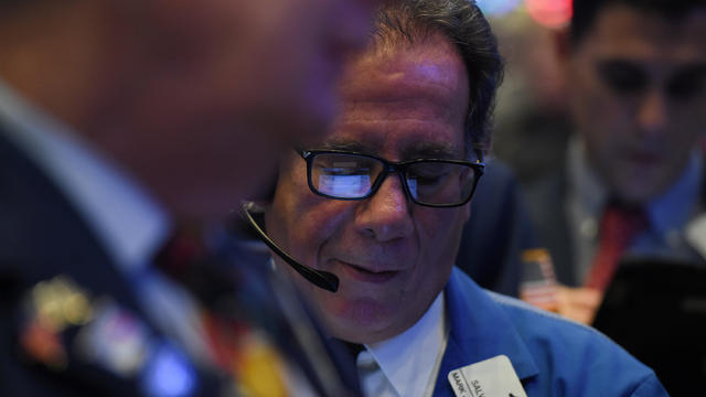 Traders look on while waiting for the initial price of Tencent Music Entertainment company's IPO on the floor of the New York Stock Exchange (NYSE) in New York 