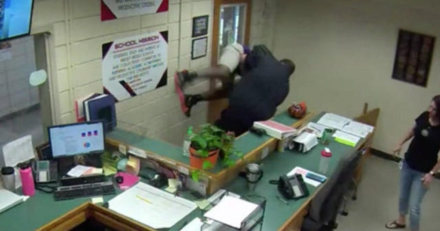 Former officers charged after video shows them slamming a middle school ...