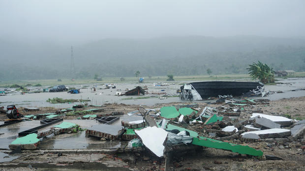 Debris is seen after a tsunami hit the area in Pandeglang, Banten province 