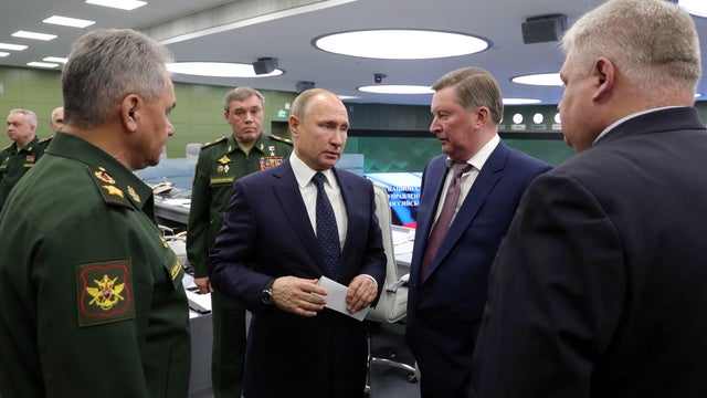 Russian President Vladimir Putin visits the National Defence Control Centre in Moscow 