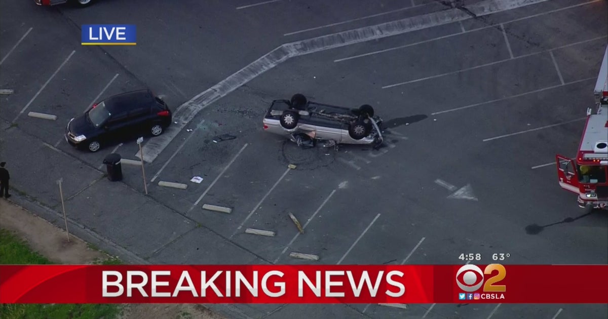 Overturned Car Critically Injures Bicyclist On PCH - CBS Los Angeles