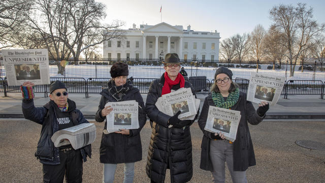 Activists Distribute "Bye-Bye 45" A Satire Edition Of The Washington Post 