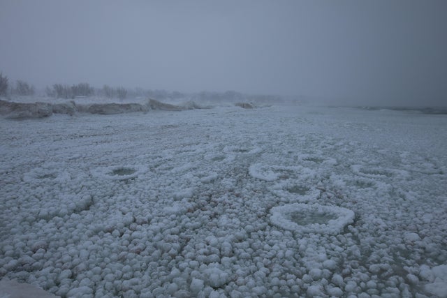 Frozen Lake Michigan is pictured in St. Joseph, Michigan