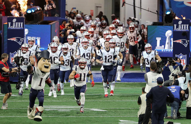 New England Patriots center David Andrews (60) celebrates a touchdown by  teammate Sony Michel (not pictured) in the fourth quarter of Super Bowl  LIII against the Los Angeles Rams at Mercedes-Benz Stadium