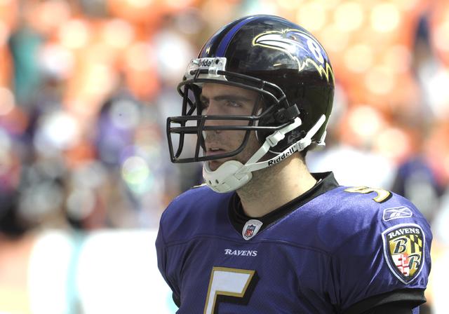 Quarterback Joe Flacco of the Baltimore Ravens is hit by linebacker News  Photo - Getty Images