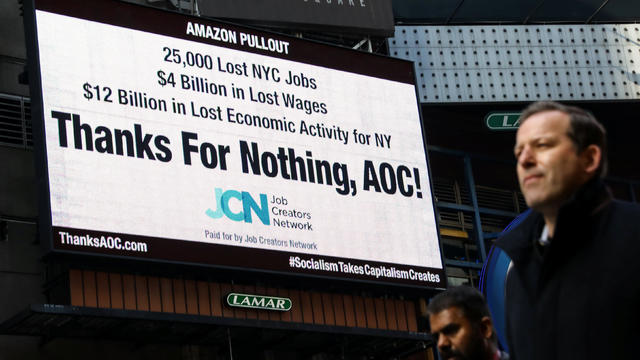 Times Square billboard displays statement about U.S. Rep. Ocasio-Cortez's Amazon pullout in New York City 