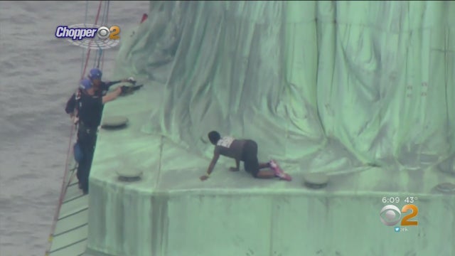 statue-of-liberty-climber.jpg 