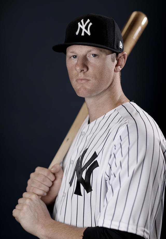 DJ LeMahieu of the New York Yankees poses with his wife during the