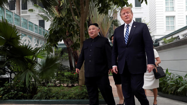 North Korean leader Kim Jong Un and U.S. President Donald Trump walk in the garden of the Metropole hotel during the second North Korea-U.S. summit in Hanoi, Vietnam 