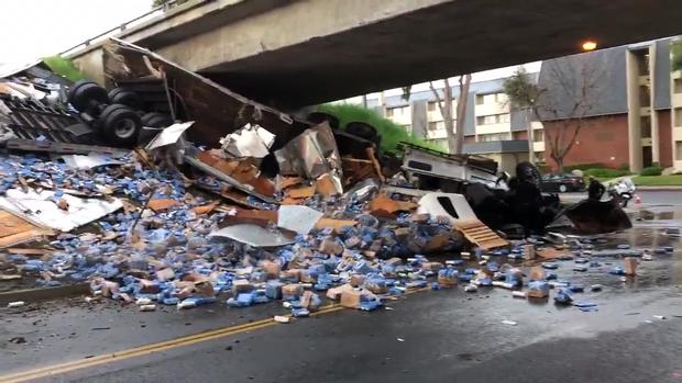 Full Load Of Beer Spills Out After Semi Overturns Under 10 Freeway In West Covina 