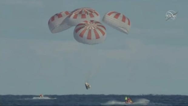 The SpaceX Crew Dragon capsule splashes down in the Atlantic Ocean on March 8, 2019. (NASA) 