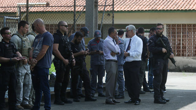 Policemen are seen at the Raul Brasil school after a shooting in Suzano 