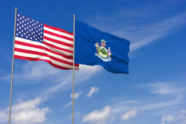 USA and Maine flags over blue sky background. 3D illustration 