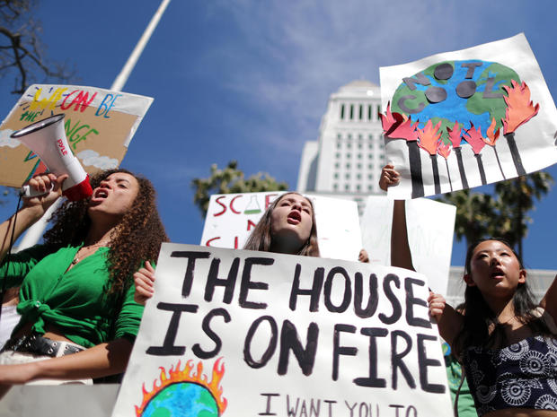 Students attend a protest rally to call for urgent action to slow the pace of climate change, in Los Angeles 