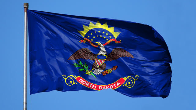 National flag State of North Dakota on a flagpole 