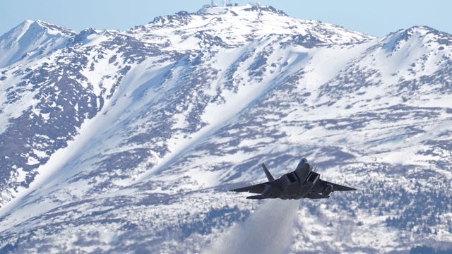 U.S. Air Force F-22 Raptor fighter takes off from close formation taxi, known as an Elephant Walk, in Alaska 