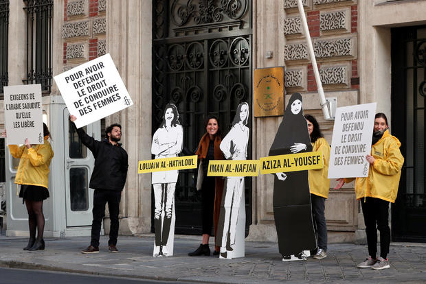 Demonstrators from Amnesty International protest outside the Saudi Arabian Embassy on International Women's day in Paris 