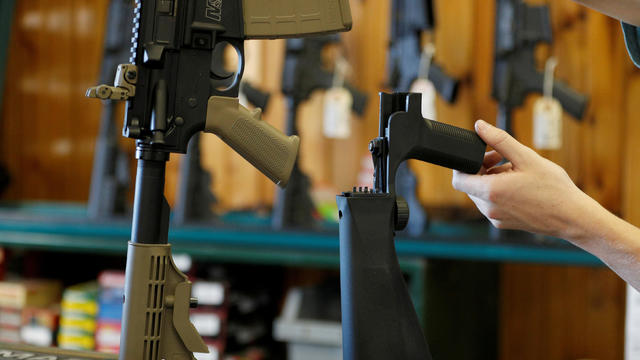 FILE PHOTO: A bump fire stock that attaches to a semi-automatic rifle to increase the firing rate is seen at Good Guys Gun Shop in Orem 