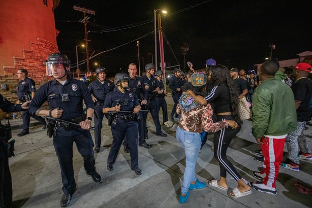 Fans Pay Respect At Scene Where Hip Hop Musician Nipsey Hussle Was Fatally Shot In Los Angeles