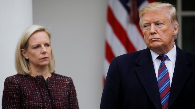 FILE PHOTO: President Trump speaks to reporters after meeting with members of Congress at the White House in Washington 