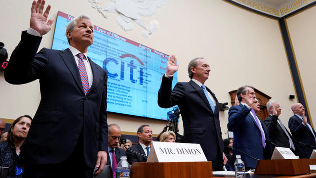 Jamie Dimon, chairman & CEO of JP Morgan Chase & Co., James P. Gorman, chairman & CEO of Morgan Stanley, and other bank CEOs are sworn in before a House Financial Services Committee hearing on Capitol Hill in Washington 