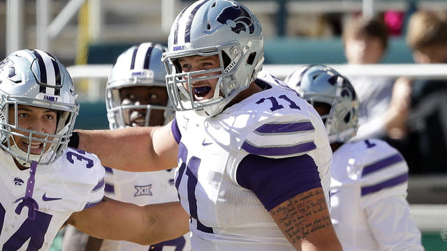 Broncos add to offensive line, select Dalton Risner