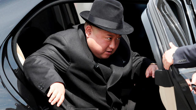 North Korean leader Kim Jong Un arrives at the railway station before his departure in Vladivostok, 