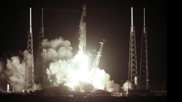 A SpaceX Falcon 9 rocket takes off loaded with a Dragon cargo craft during a resupply mission to the International Space Station from Cape Canaveral 